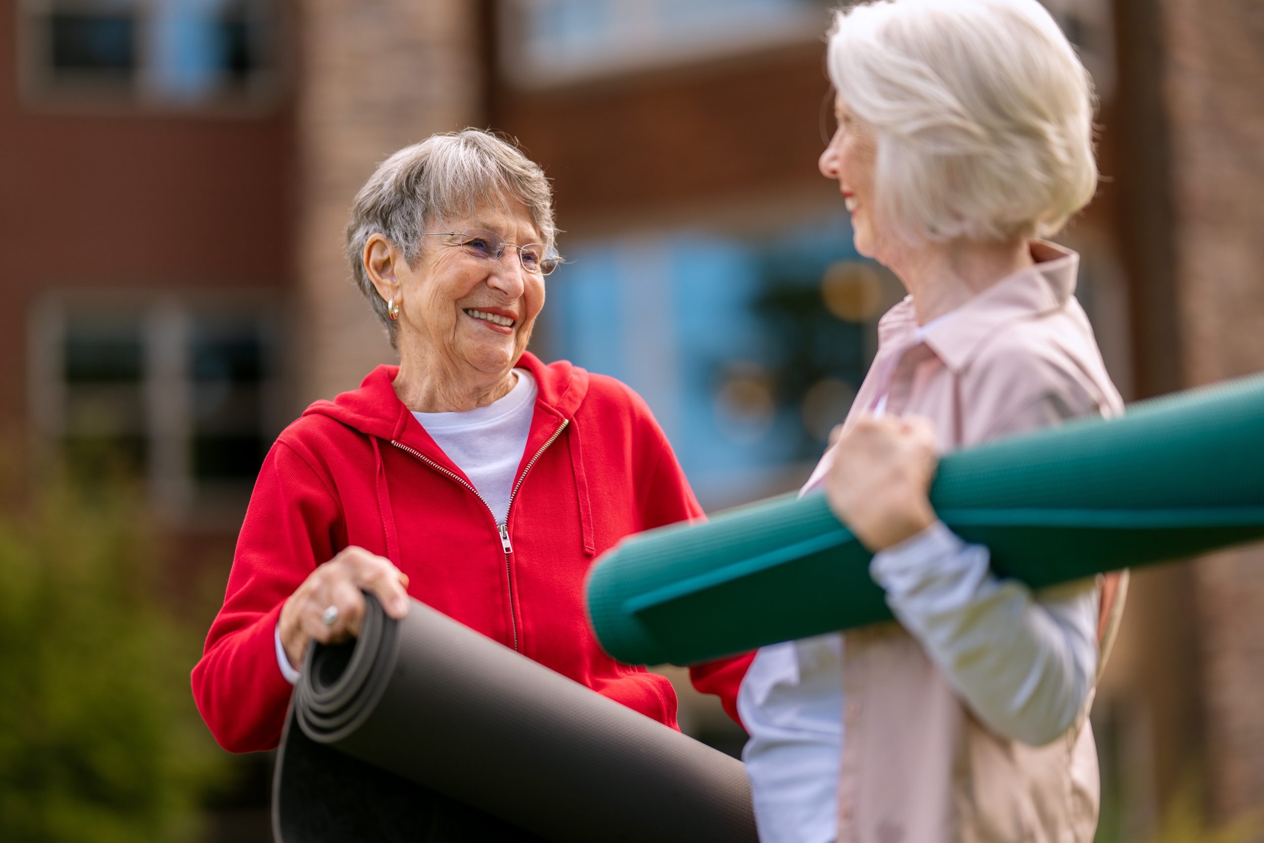 TM-Lifestyle-3-2509-web Residents with yoga mats